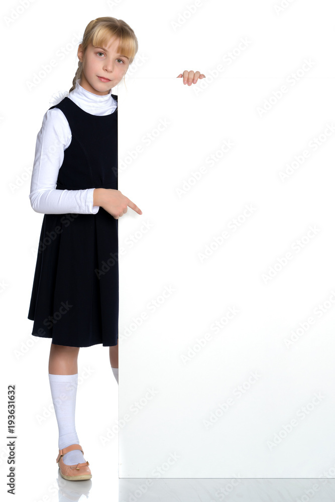 Little girl is showing a finger on a white banner. Little girl is showing a finger on a white banner.