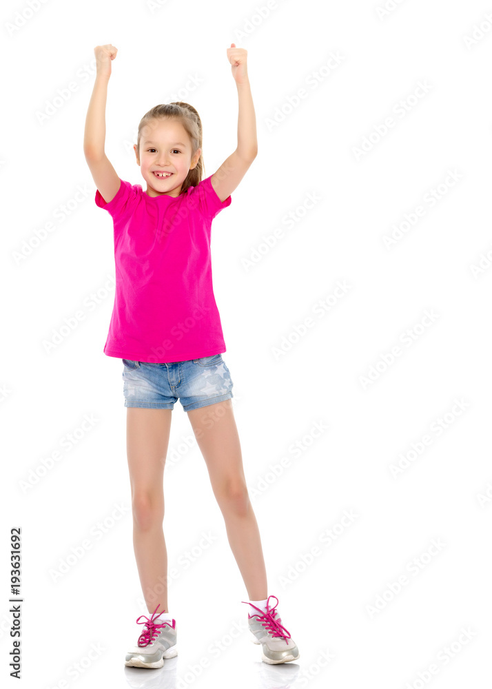 Naklejka premium Little girl holding her thumb up