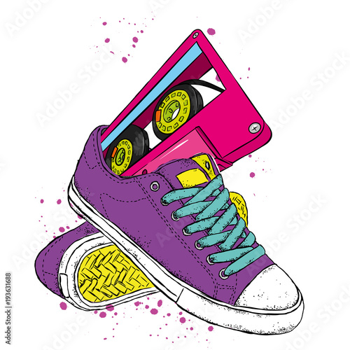 Sneakers and audiocassette. Music and shoes. Retro, vintage, 80s and 90s.