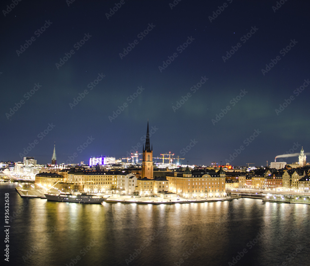 Night panorama with northern lights of Gamla Stan (Old Town), Stockholm , Sweden Night panorama with northern lights of Gamla Stan (Old Town), Stockholm , Sweden
