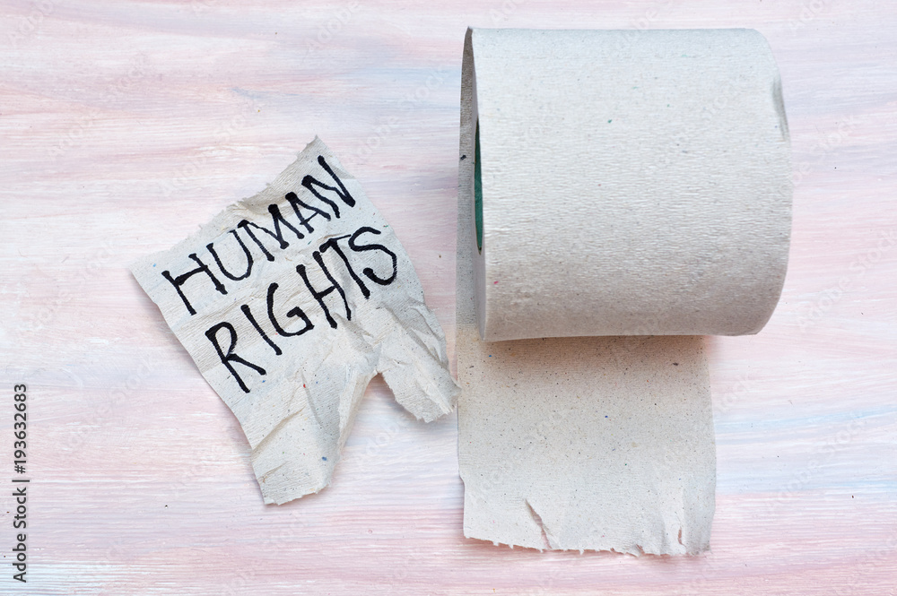 The inscription on the toilet paper "human rights". The concept of  non-observance of human rights. Stock Photo | Adobe Stock