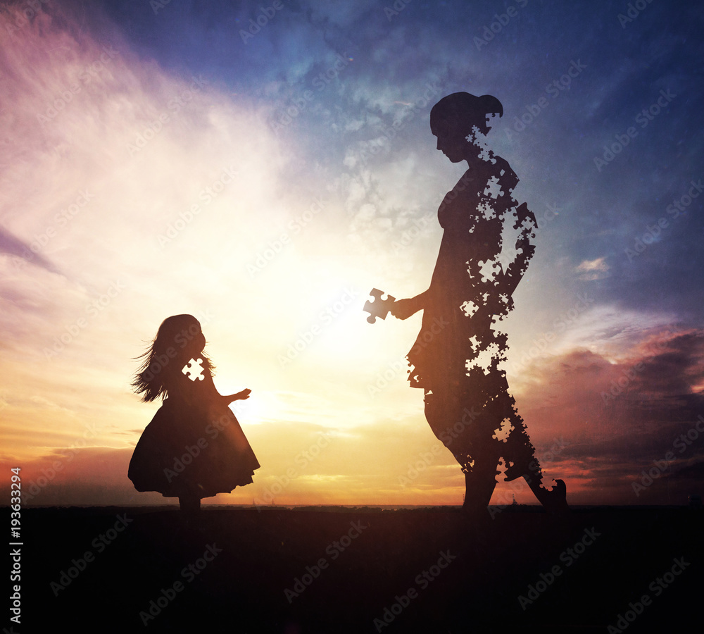 Mother raising her daughter Stock Photo | Adobe Stock