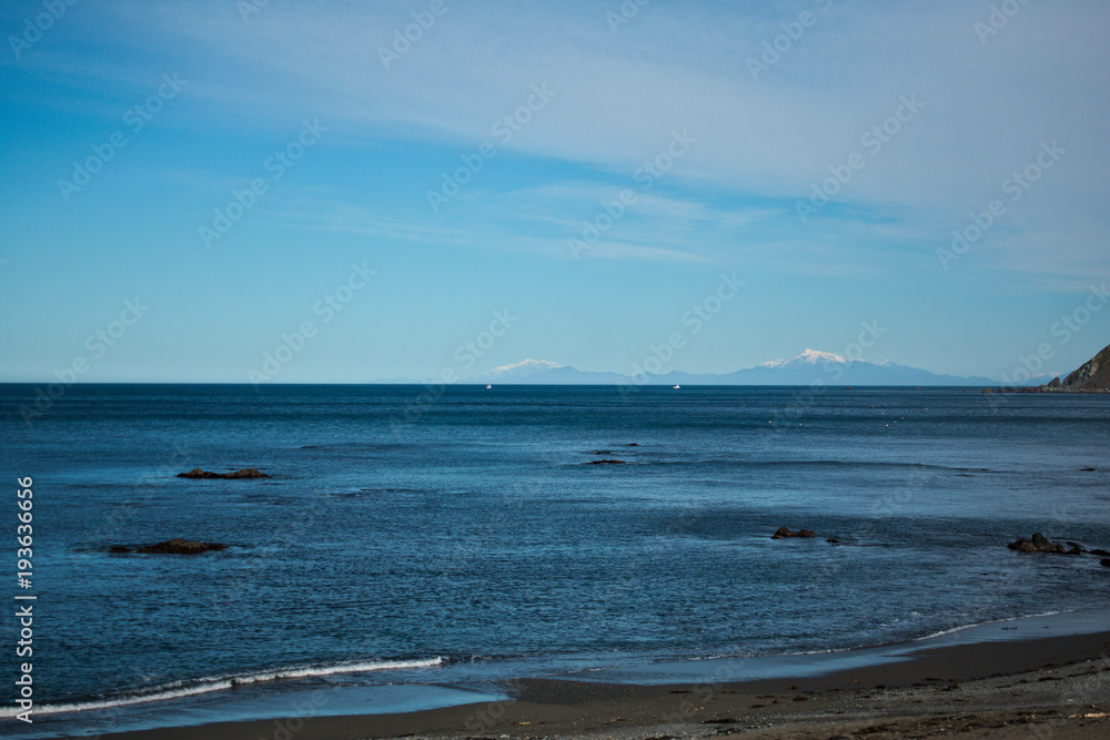 Kaikoura Ranges from Red Rocks Reserve, Wellington, New Zealand Kaikoura Ranges from Red Rocks Reserve, Wellington, New Zealand