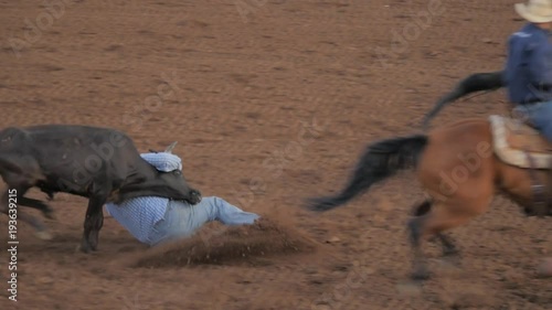 Steer wrestling at a small town rodeo arena