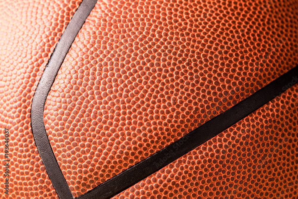 Obraz premium Orange basketball skin close up