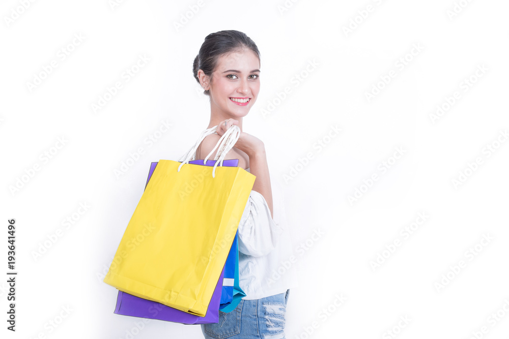Beautiful woman with a lot of shopping bags isolated on white background. Beautiful woman with a lot of shopping bags isolated on white background.