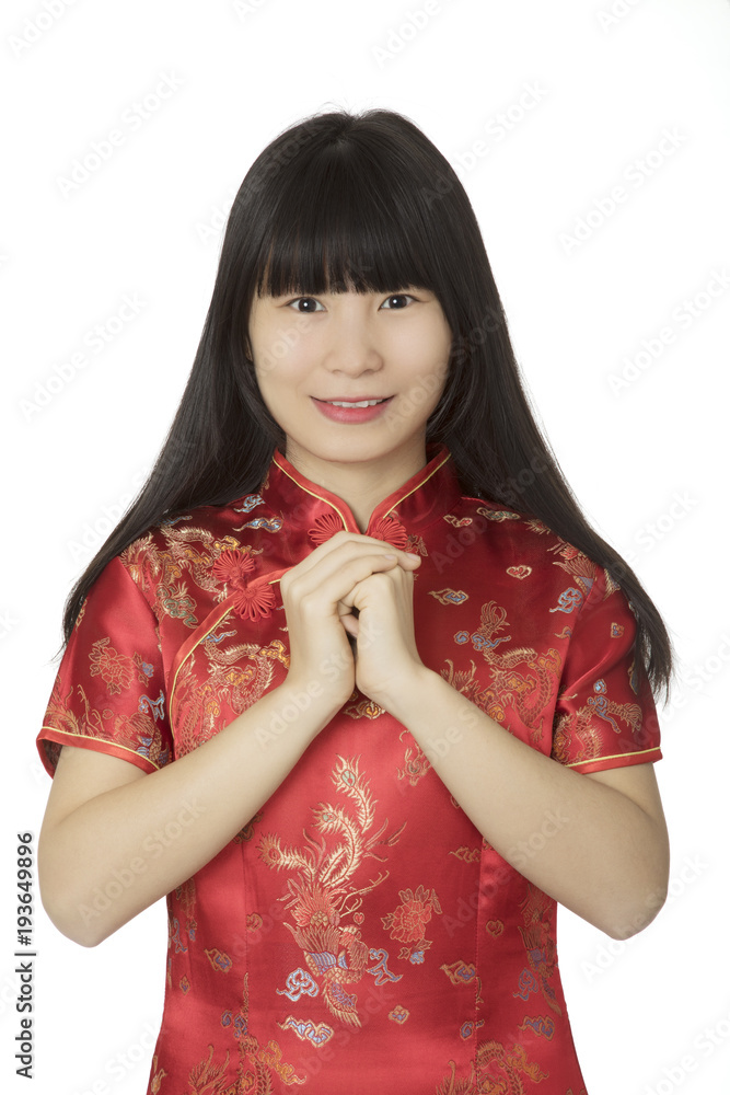 Beautiful Chinese woman wearing a Chipao isolated on white background Beautiful Chinese woman wearing a Chipao isolated on white background