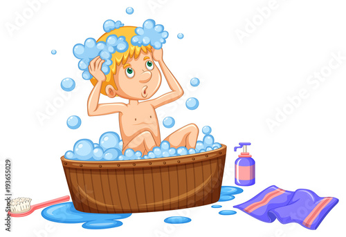 Boy taking bath in brown tub