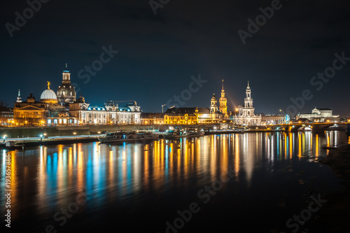 Beautiful night view of the city and reflections in the Elbe river in Dresden, Germany