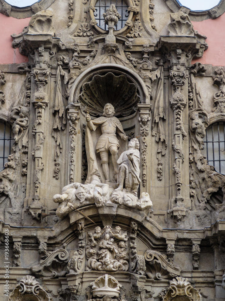 Detail of one of the sculptures of the main facade of the museum of the history of madrid