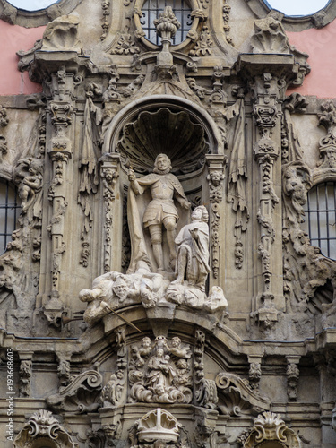 Detail of one of the sculptures of the main facade of the museum of the history of madrid