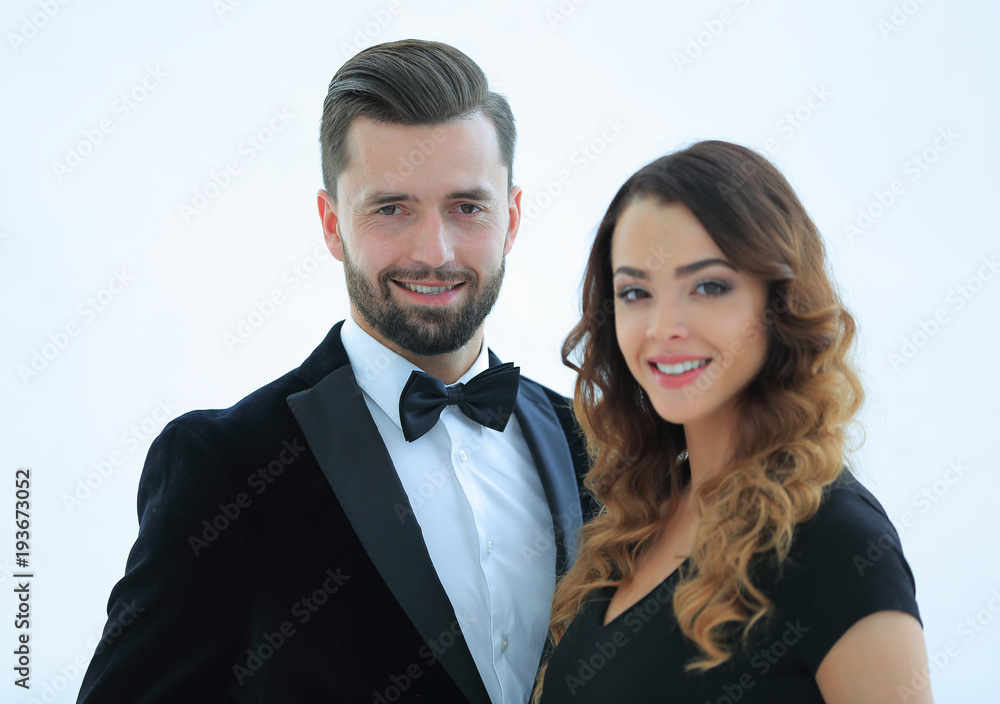 Portrait of a handsome man looking at the camera with a woman Portrait of a handsome man looking at the camera with a woman