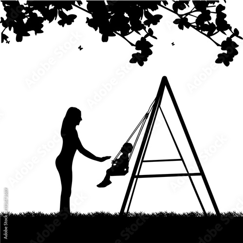 Mother swinging child on a swing in the park, one in the series of similar images silhouette