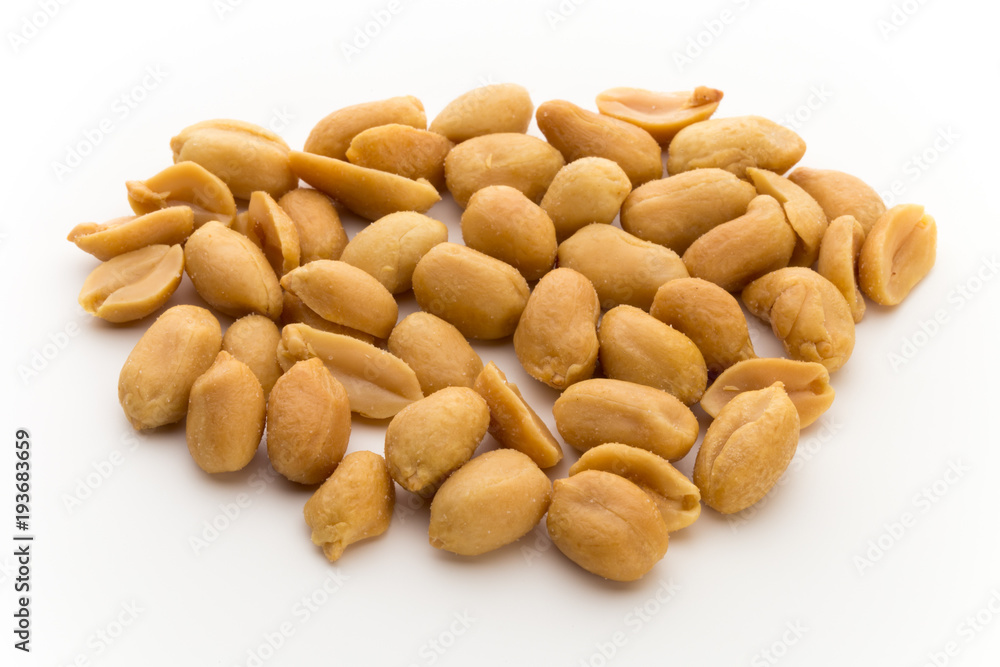 Peeled peanuts on the isolated background. Peeled peanuts on the isolated background.