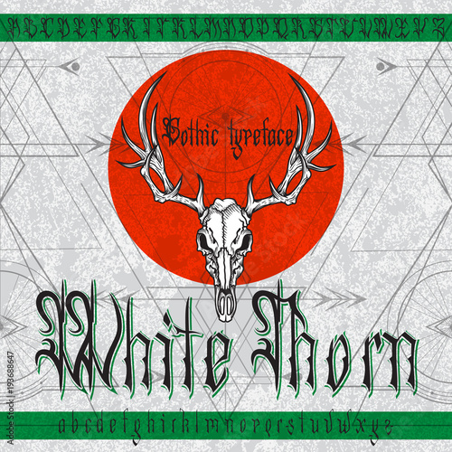 "White Thorn" Gothic typeface. Stylish Gothic font set with deer skull and sacred geometry ornament on black grunge background. Good fore alcohol labels, posters, stickers.