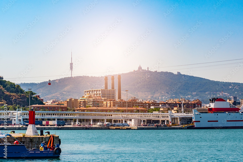 Port in Barcelona, sunny summer day, ships and yachts