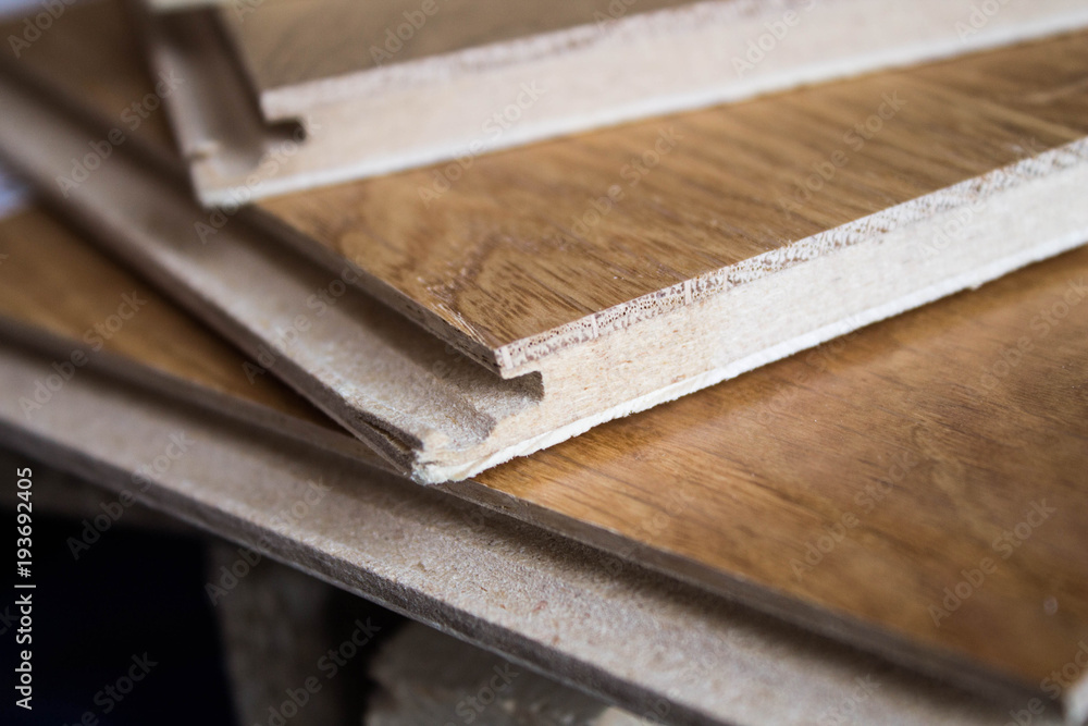 Samples of laminate and parquet board. Selection and types of floor coverings. Samples of laminate and parquet board. Selection and types of floor coverings.