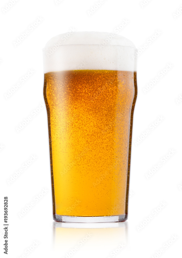 Cold glass of lager ale beer with foam and dew Cold glass of lager ale beer with foam and dew