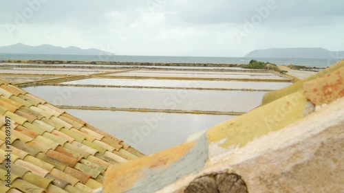 16802_An_empty_field_with_water_on_it_in_Trapani_Sicily_Italy.mov photo