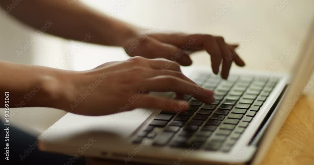 4k, Young attractive woman working from home on her laptop. Slow motion. 4k, Young attractive woman working from home on her laptop. Slow motion.