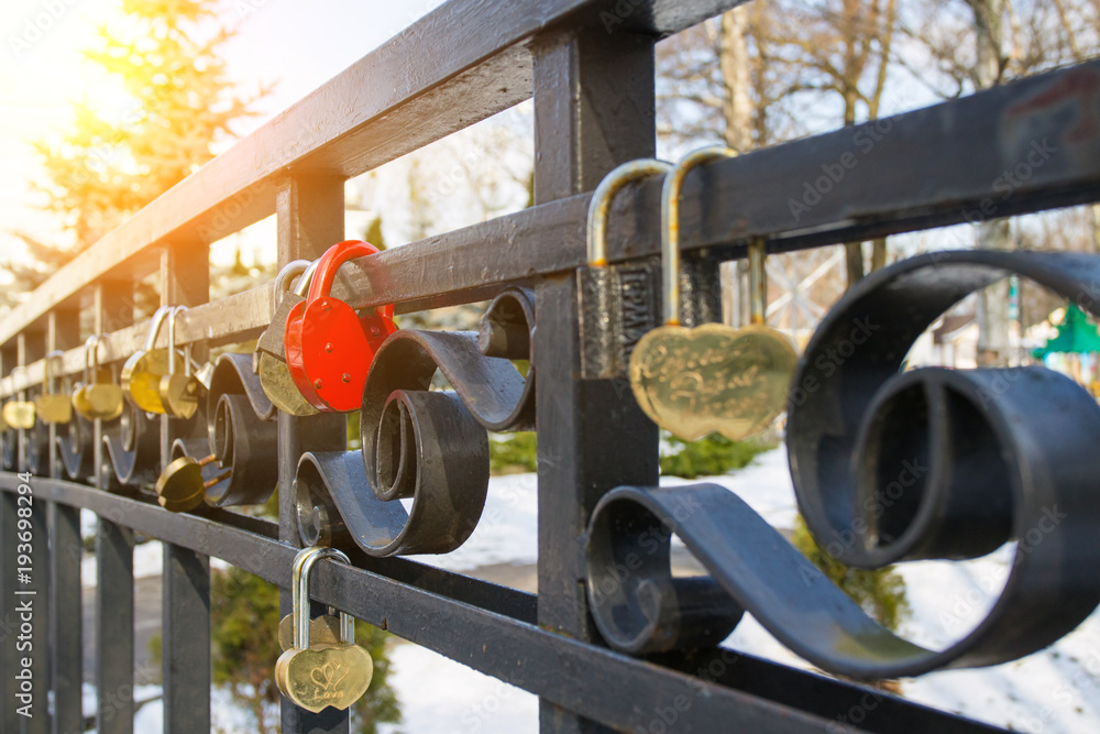 locks of loving couples on a bridge, symbol