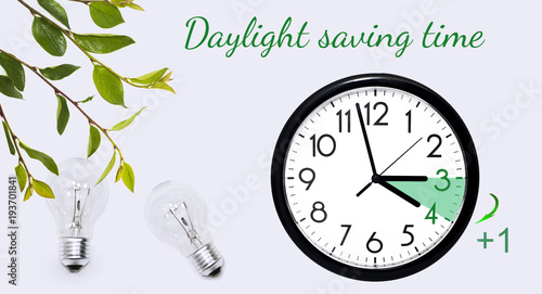 Daylight Saving Time. Change clock to summer time. photo