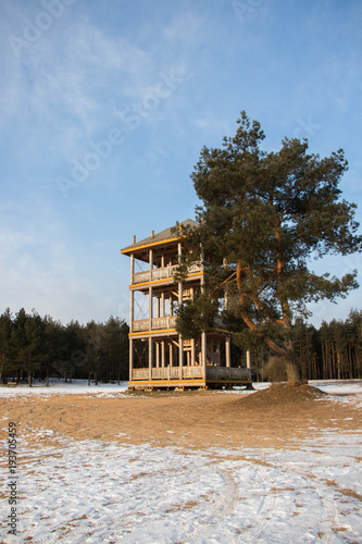 Wallpaper Mural wooden tower with sun snow and blue bright sky Torontodigital.ca