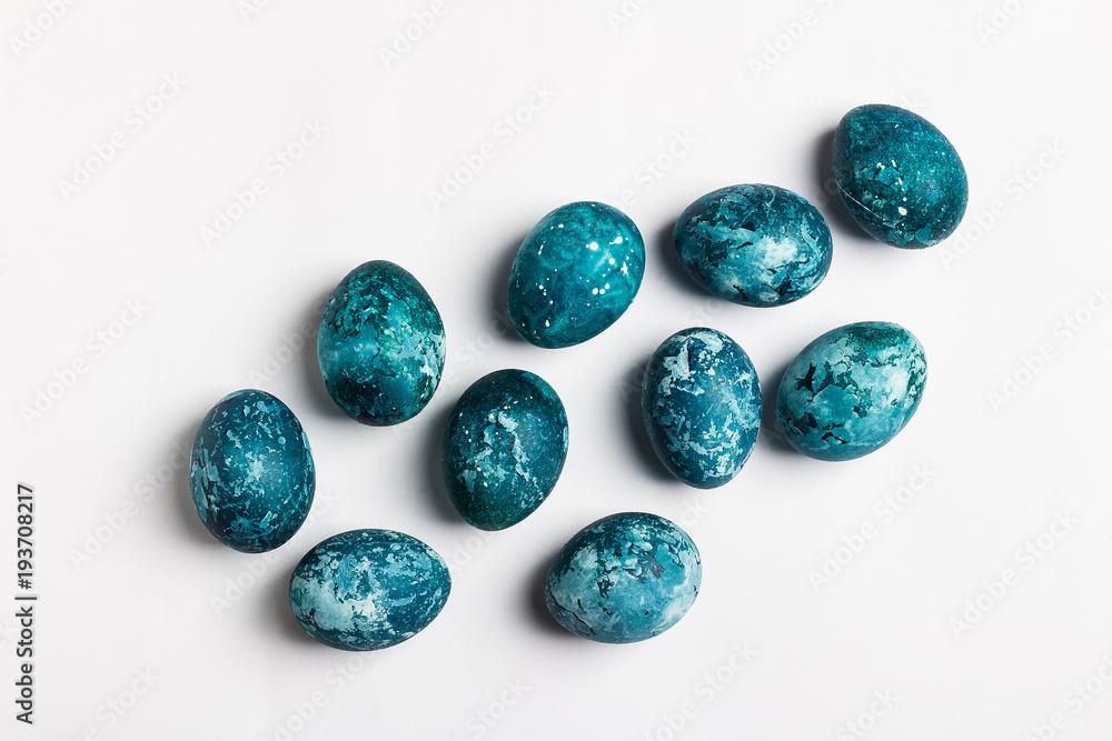 Easter eggs isolated painted by hand in blue color on white background Easter eggs isolated painted by hand in blue color on white background