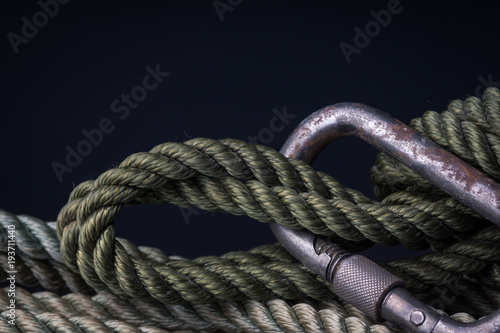 Coiled rope and carabiner