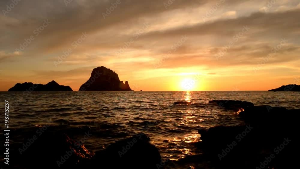 The sunset on the island of Es vedra, Ibiza The sunset on the island of Es vedra, Ibiza