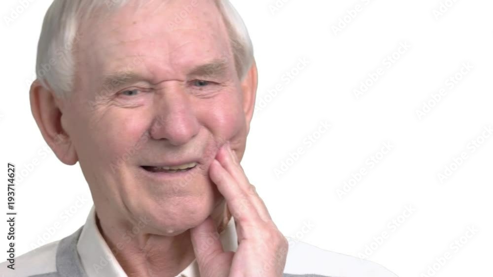 Close up old man having strong toothache. Senior man with sensitive toothache crown problem, white background. Dental care concept. Close up old man having strong toothache. Senior man with sensitive toothache crown problem, white background. Dental care concept.