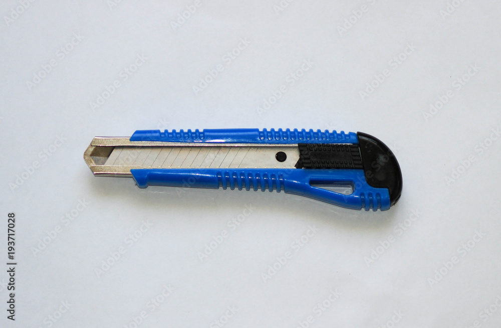 office building knife lying on white background office building knife lying on white background