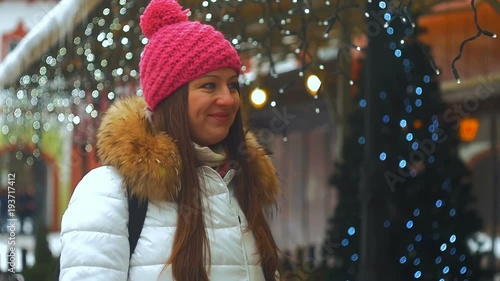 Young woman smile face in winter city photo