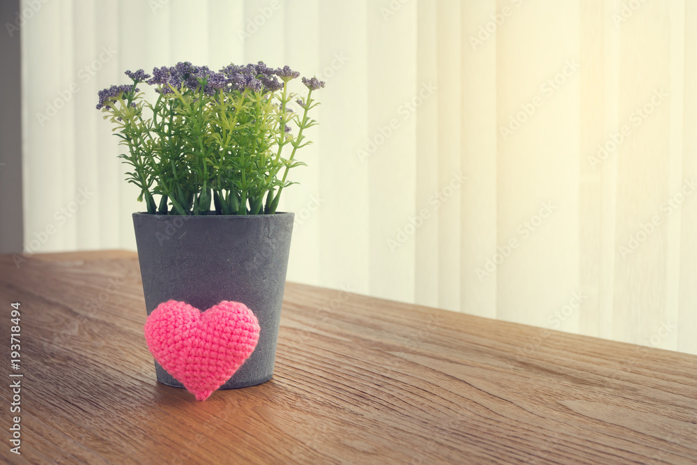 Wood Office table with Beautiful Pink knitted fabric heart shape, Purple  garden flower pot on white curtain windows texture background. view from  front office table. concept of valentine's day. Photos | Adobe