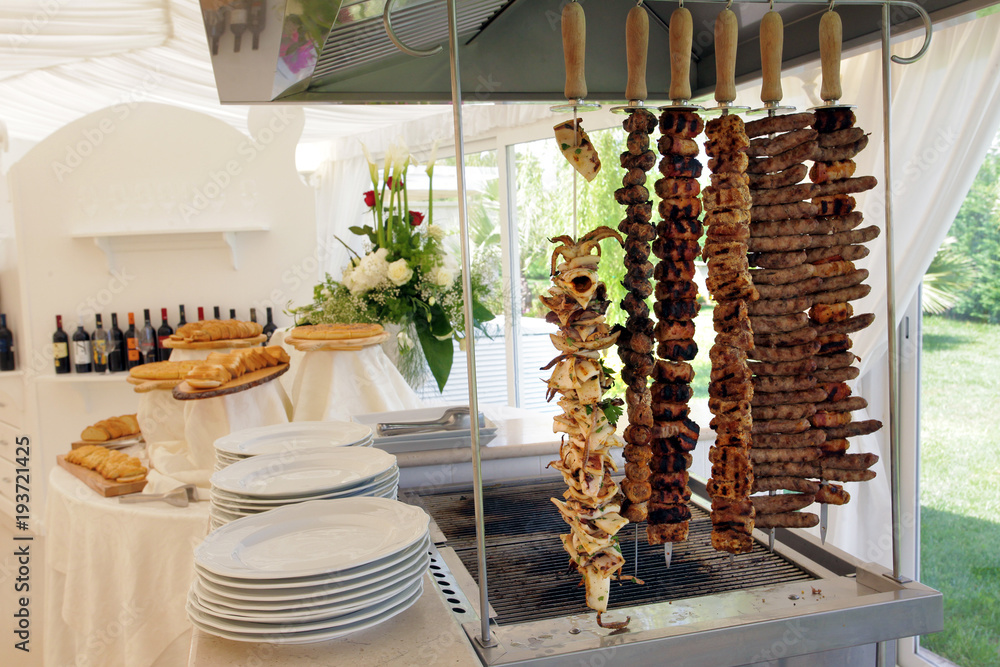 Barbeque prepared on skewers in a restaurant