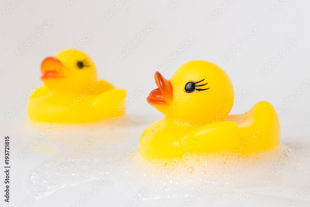 Yellow plastic ducks at bathtub Yellow plastic ducks at bathtub