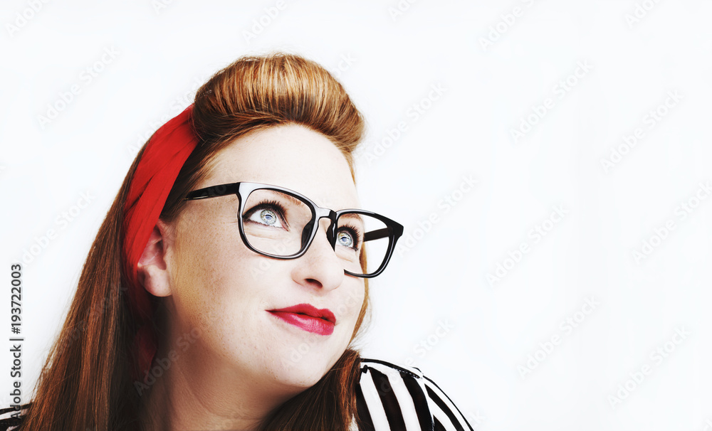 Fashionable redhead woman in pin up style Fashionable redhead woman in pin up style