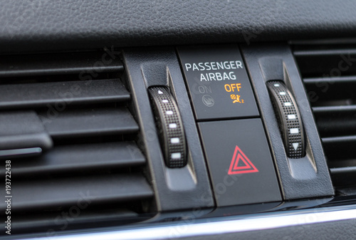 Passenger airbag indicator light showing OFF status on the dashboard of a modern car