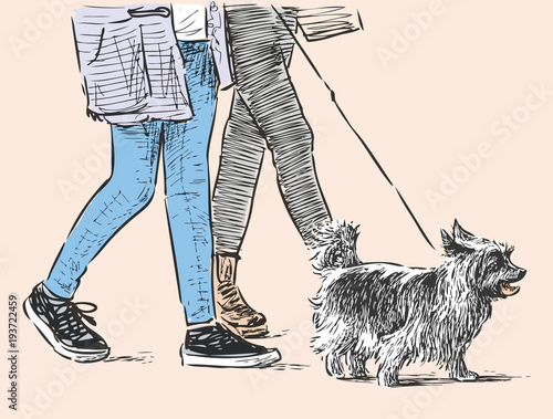 Citizens with a pet go for a walk