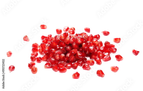 Pile pomegranate seeds isolated on white background