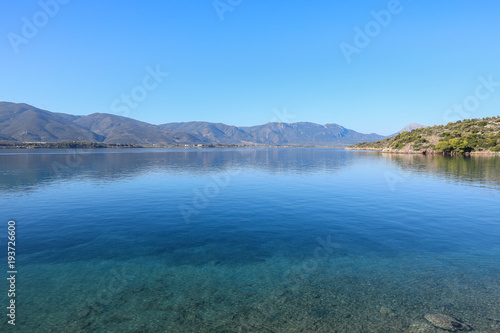 Fototapeta Naklejka Na Ścianę i Meble -  Summer time Love bay Poros island, Agrosaronikos, Greece.