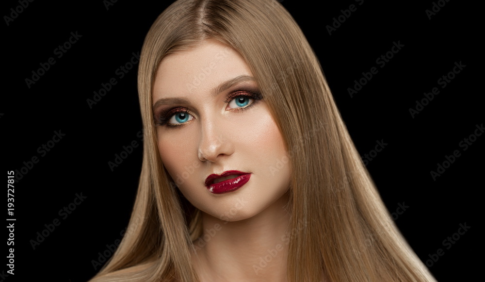 Fototapeta premium Face, blue eyes, black background
