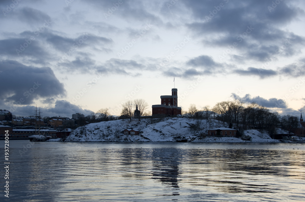 Castle at Stockholm waterfront a cold winter evening