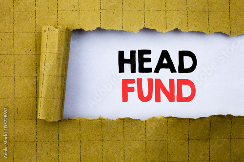 Head Fund. Business concept for Investment Funding Money  written on white paper on the yellow folded paper. photo