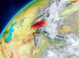 Space view of Tajikistan in red