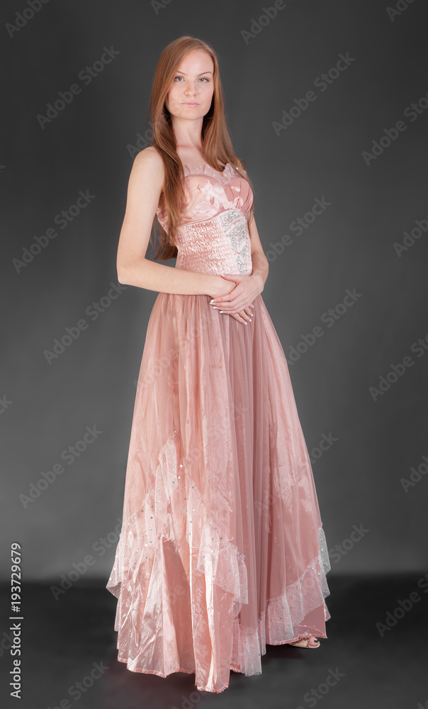 slender girl in an evening dress slender girl in an evening dress