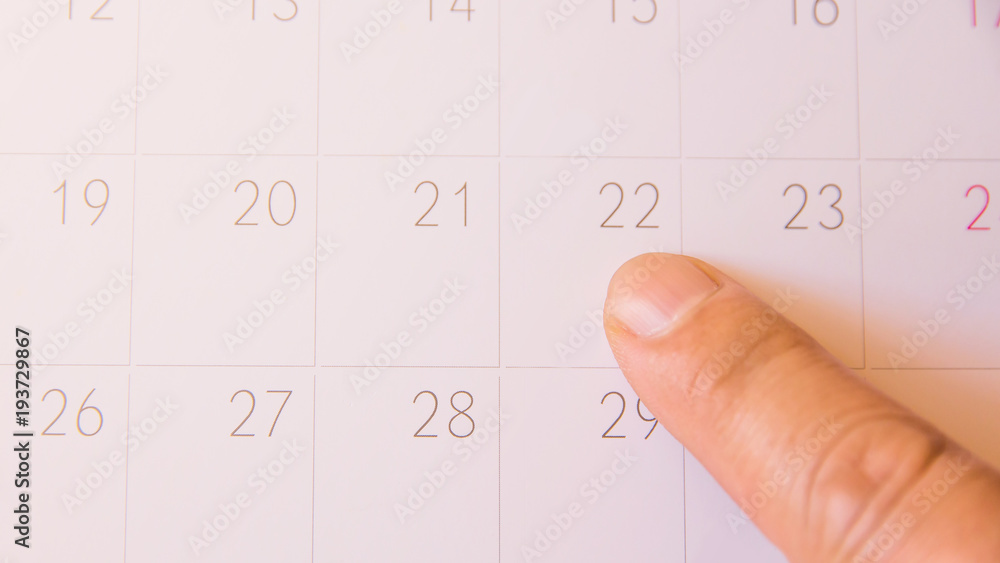 finger push on calendar page for remind and marked important events day,finger pin in a calender on important date finger push on calendar page for remind and marked important events day,finger pin in a calender on important date