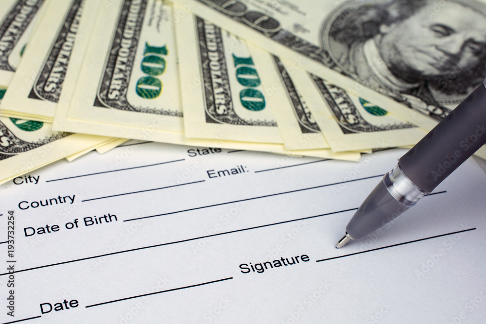 put a signature on an contract waiting to be signed money dollars put a signature on an contract waiting to be signed money dollars