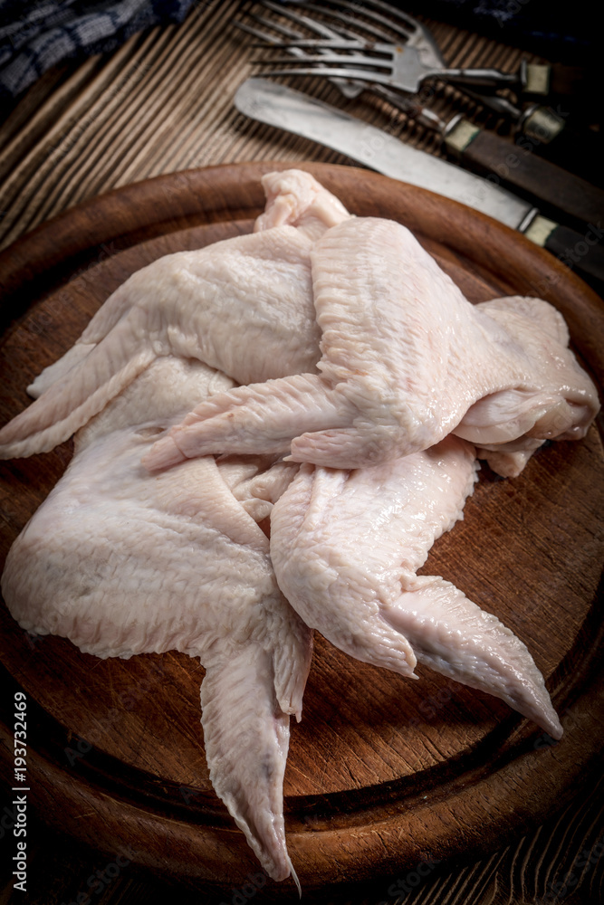 Fresh raw chicken wing. Fresh raw chicken wing.
