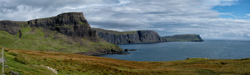 A view of the dramatic coastline on the Isle of Skye near the Neist Point Lighthouse.